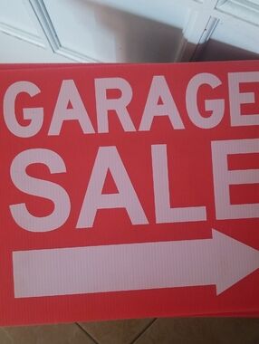 Bold Red 'Garage Sale' Arrow Sign